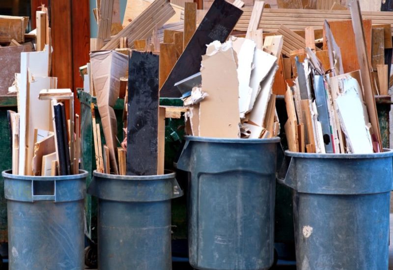 Construction Debris in bins during a removal job by Go Big BLue